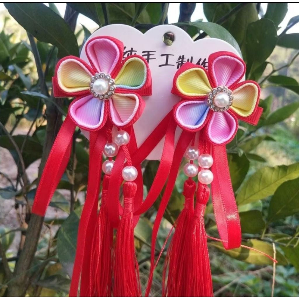 Pekanbaru Pita Imlek Li Hua Sepasang
