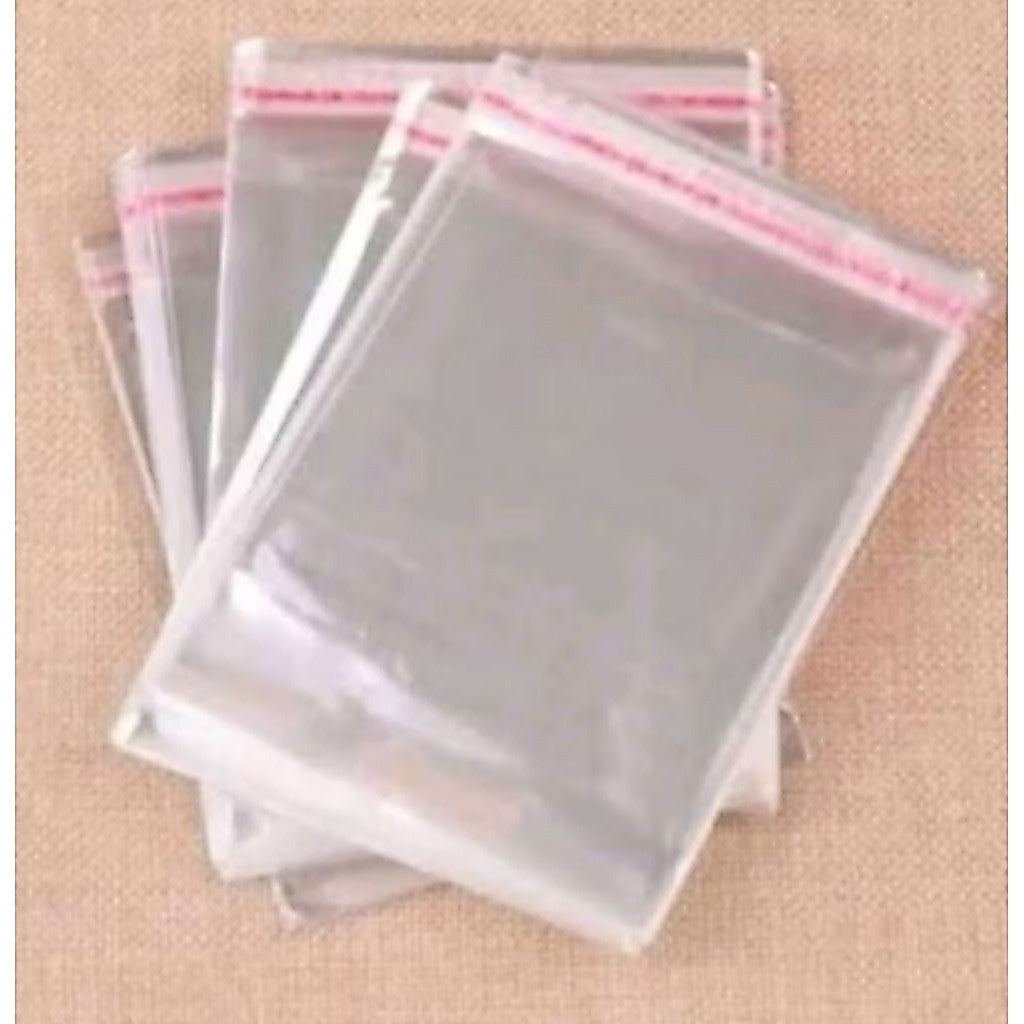 Pekanbaru Opp Plastik Tebal isi -+ 100 Lembar / Plastik Opp Lem Seal